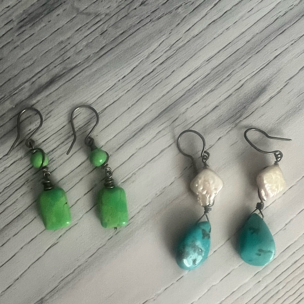 Pair of green and teal dangle earrings